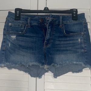 Blue Denim distressed jean shorts. Size 6 from American Eagle